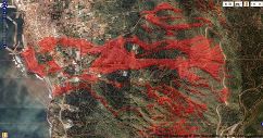 災害情報共有マップの表示例。伊豆大島元町地区周辺の正射画像に土砂流出範囲と火山基本図を重ね合わせて表示しています。